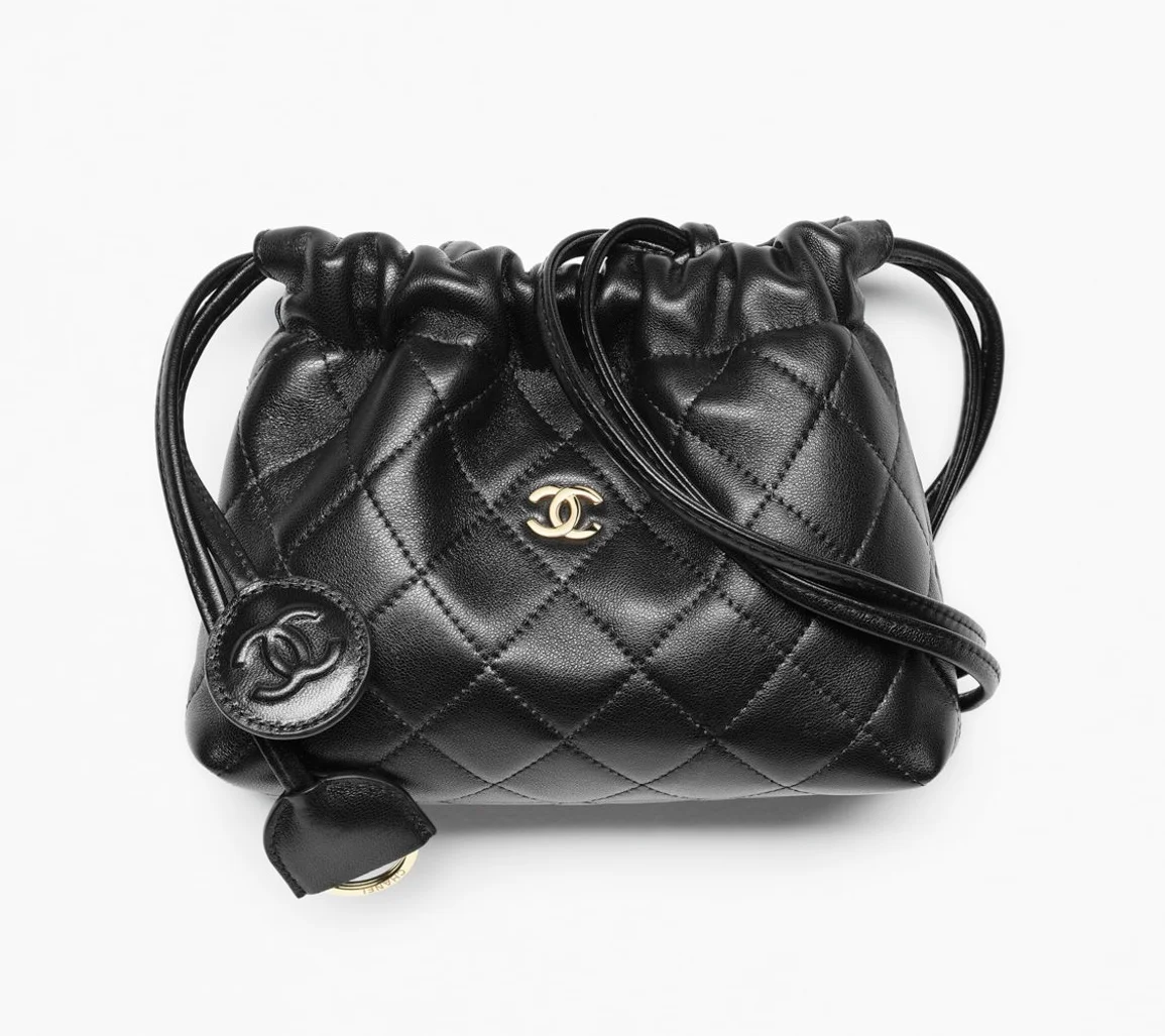 chanel drawstring clutch with leather strap ss26